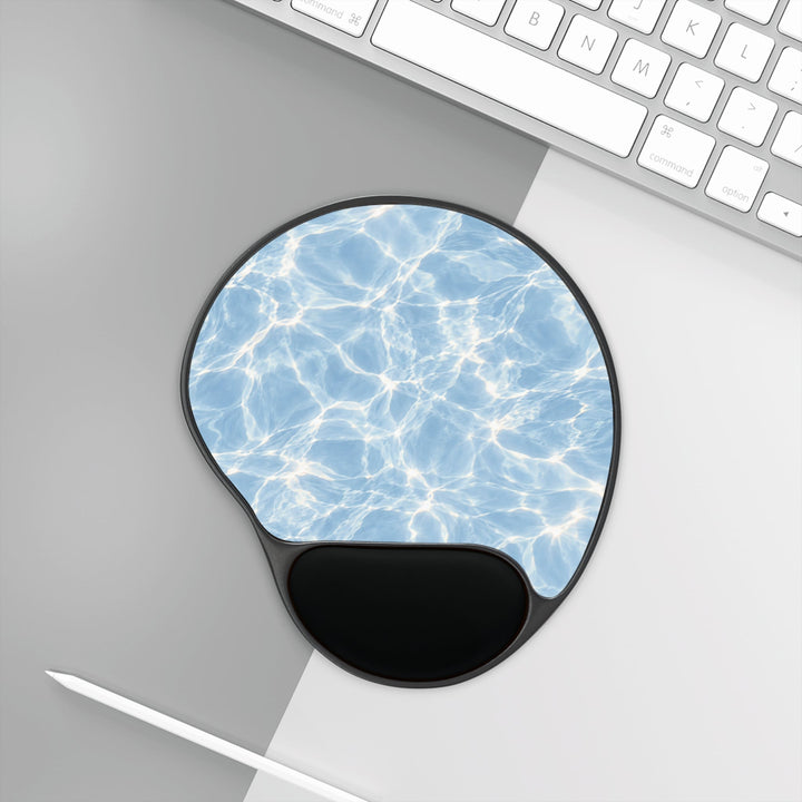 Sunday Theory Aqua Ripple mouse pad with ergonomic black memory foam wrist rest on a desk next to a keyboard