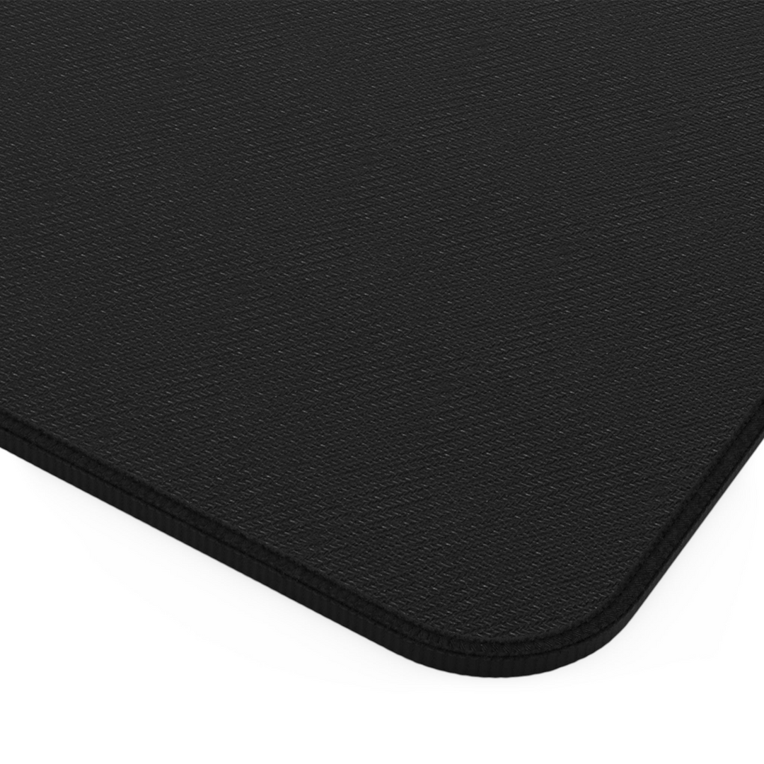 Sunday Theory black neoprene desk mat with textured non-slip backing and durable hemmed edges for workspace stability.