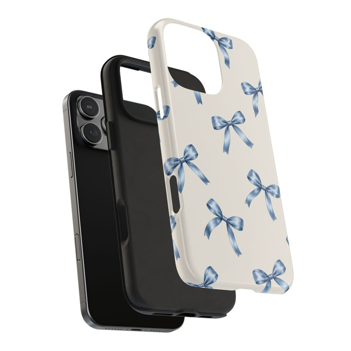 Sunday Theory protective phone case with cream background and blue watercolor bow pattern, showing two-piece design.