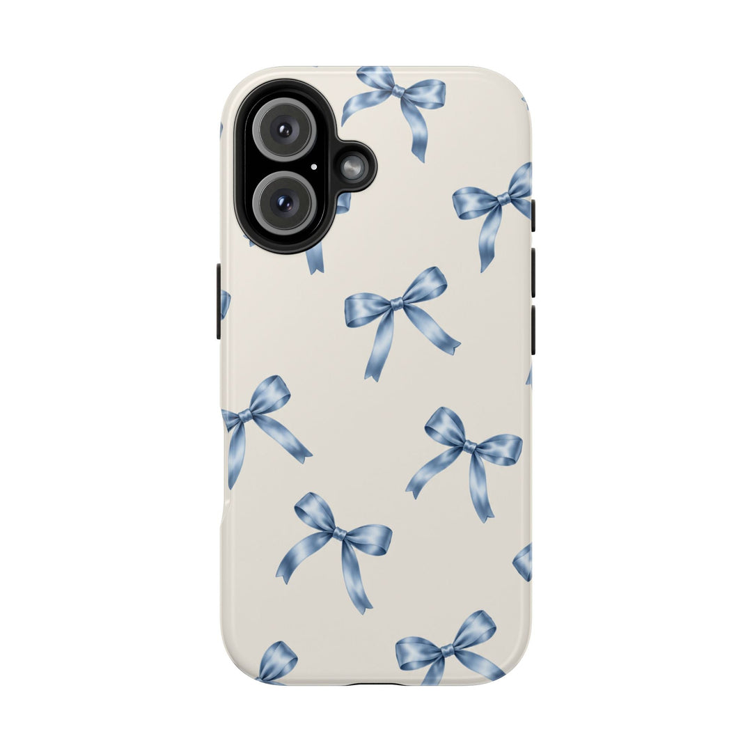 Sunday Theory protective phone case with a cream background and delicate watercolor blue bow pattern, glossy finish.