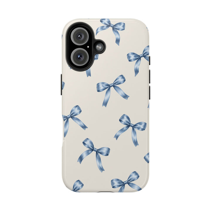 Sunday Theory protective phone case with a cream background and delicate watercolor blue bow pattern, glossy finish.