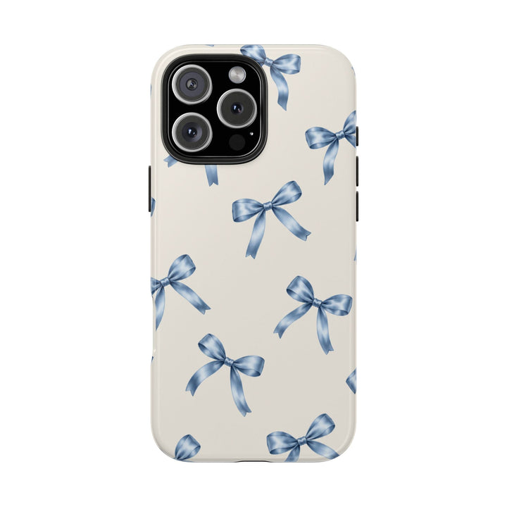 Sunday Theory protective phone case with a cream background and delicate watercolor-blue ribbon bow pattern.