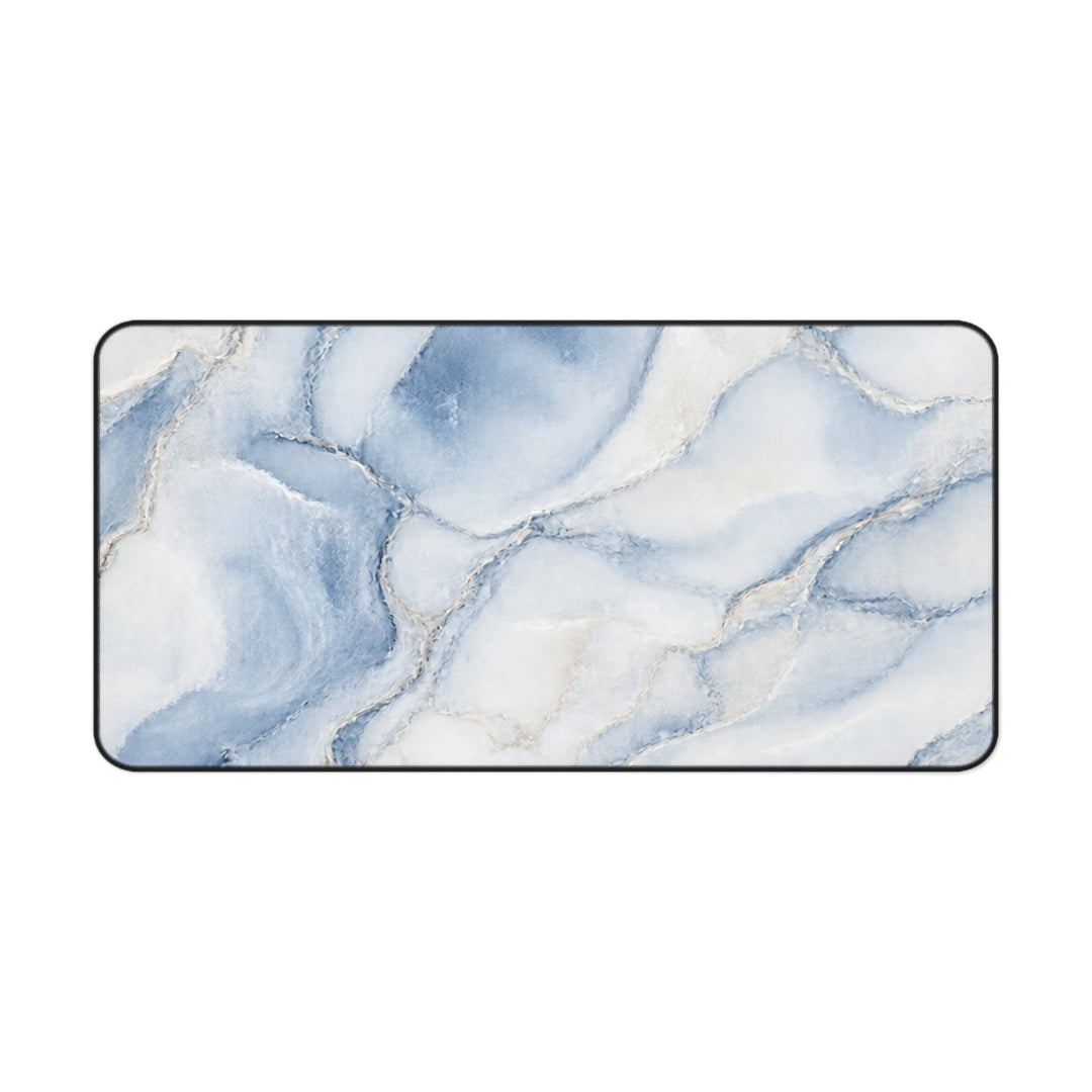 Sunday Theory blue marble desk mat with watercolor patterns, smooth neoprene surface, and durable hemmed edges.