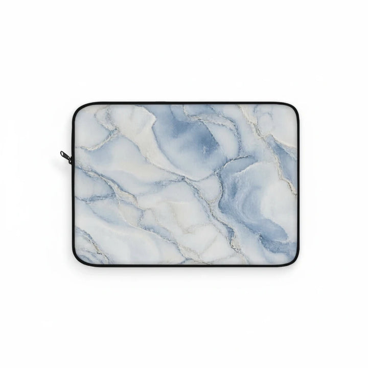 Sunday Theory blue and cream watercolor marble laptop sleeve with plush fleece interior and black zipper trim.