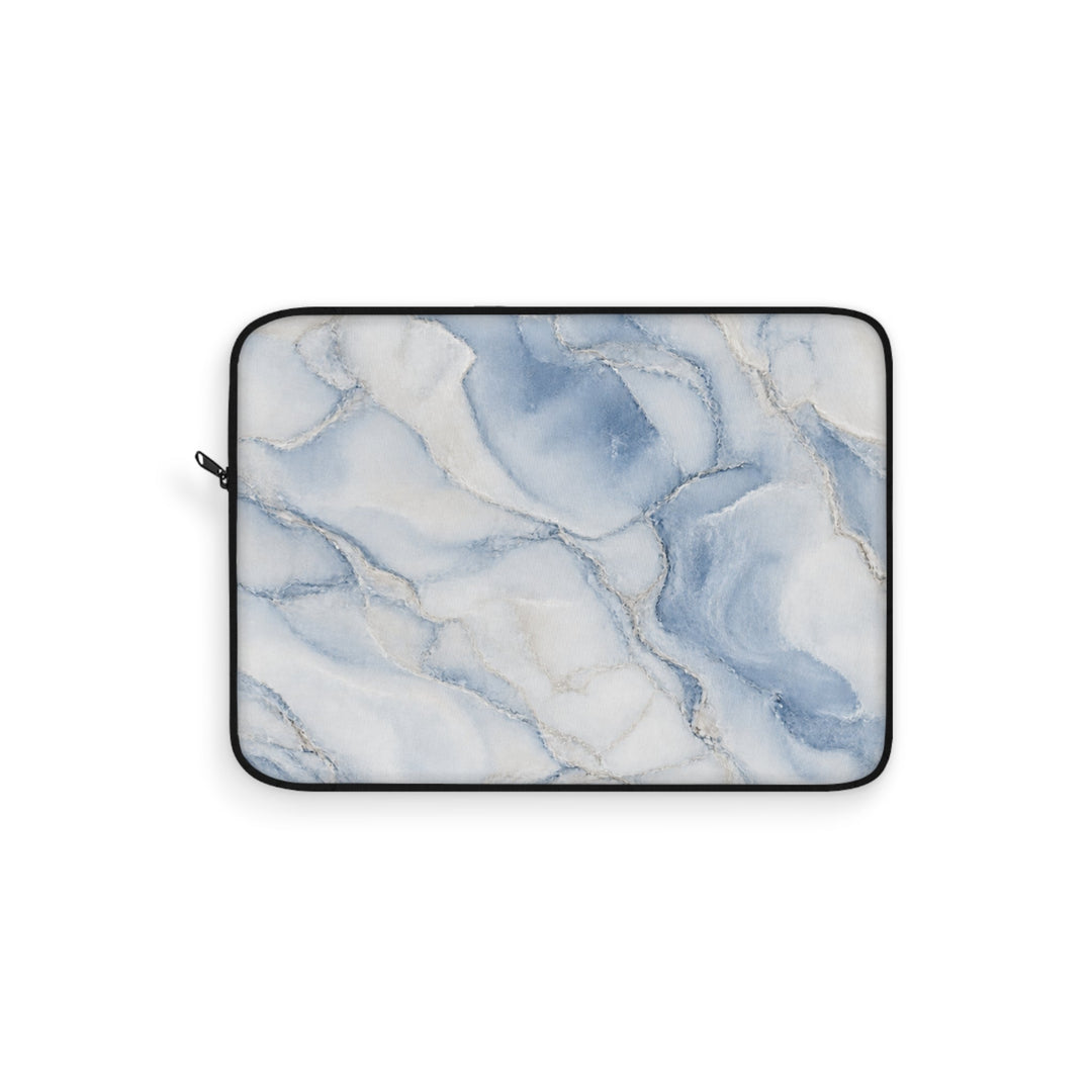 Sunday Theory blue and cream watercolor marble laptop sleeve with plush fleece interior and black zipper trim.