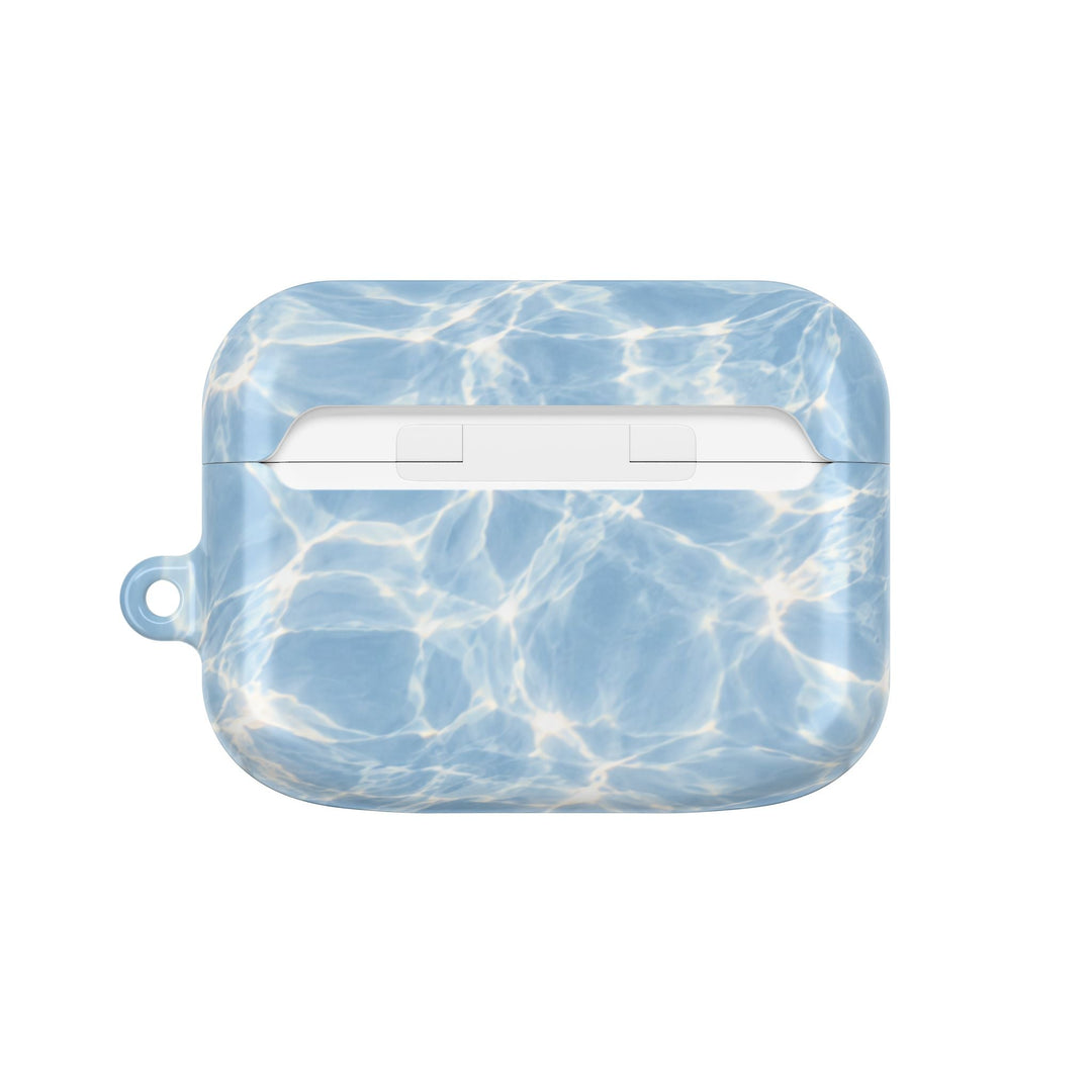 Sunday Theory glossy blue water ripple pattern polycarbonate AirPod case with a side loop for a carabiner.