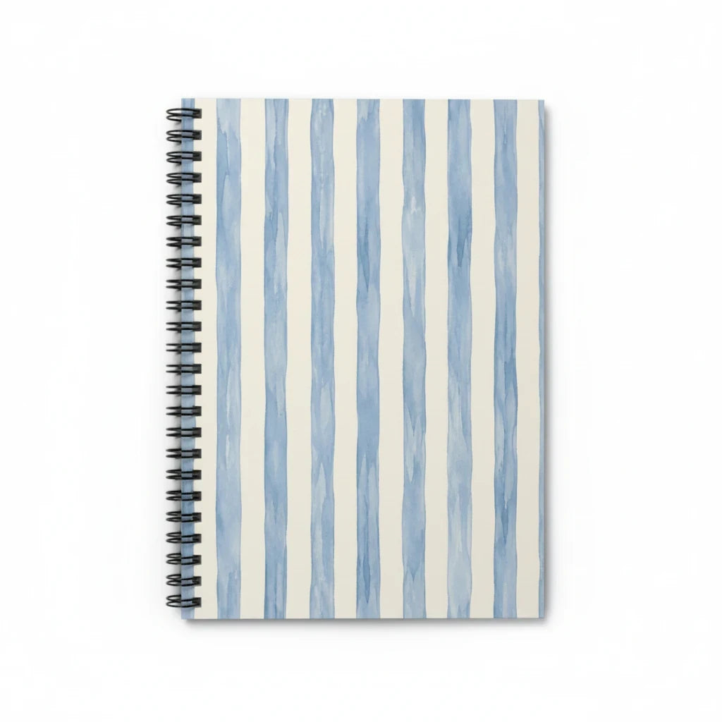 Sunday Theory spiral notebook featuring a blue watercolor vertical stripe pattern on a white cover.