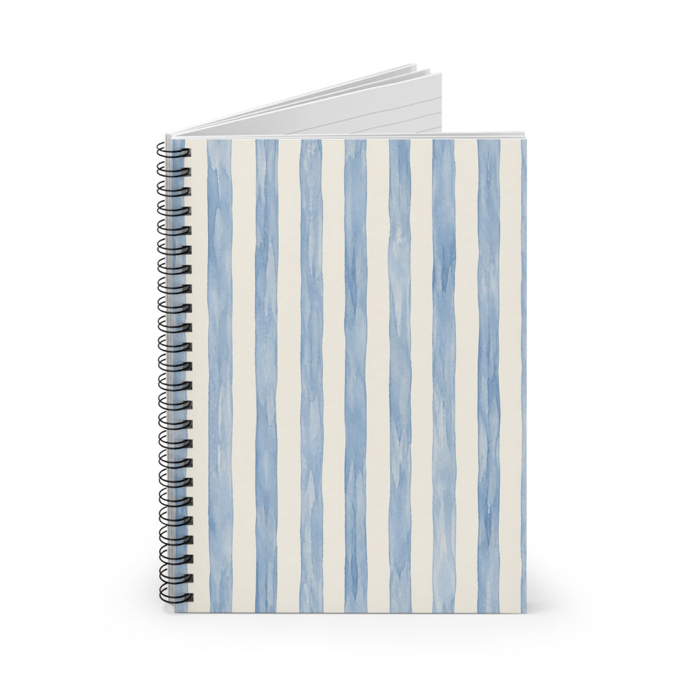 Sunday Theory spiral notebook with blue watercolor vertical stripes on a white cover and metal binding