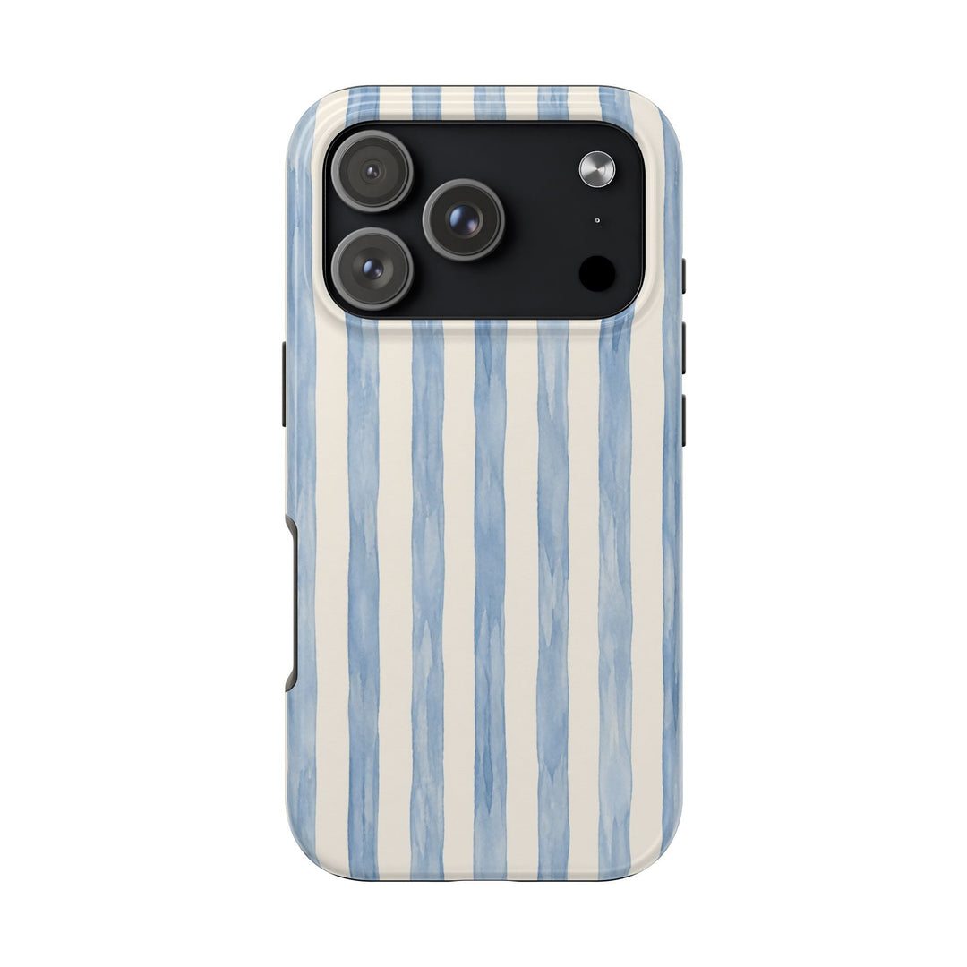 Sunday Theory protective phone case featuring hand-painted blue watercolor stripes on a glossy, durable shell.