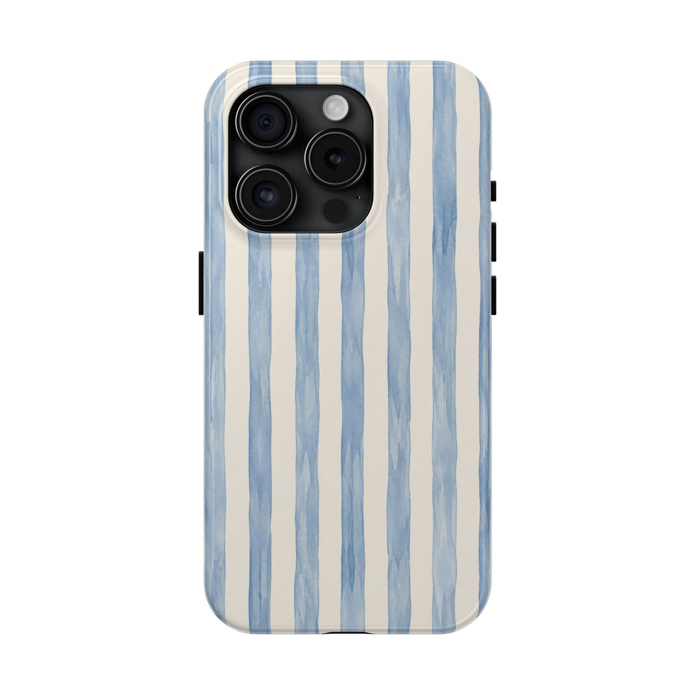 Sunday Theory protective phone case featuring soft blue hand-painted watercolor stripes on a glossy white background.