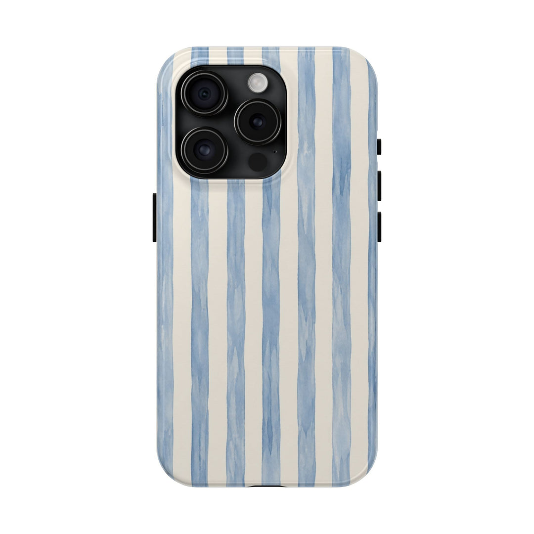 Sunday Theory protective phone case featuring soft blue hand-painted watercolor stripes on a glossy white background.