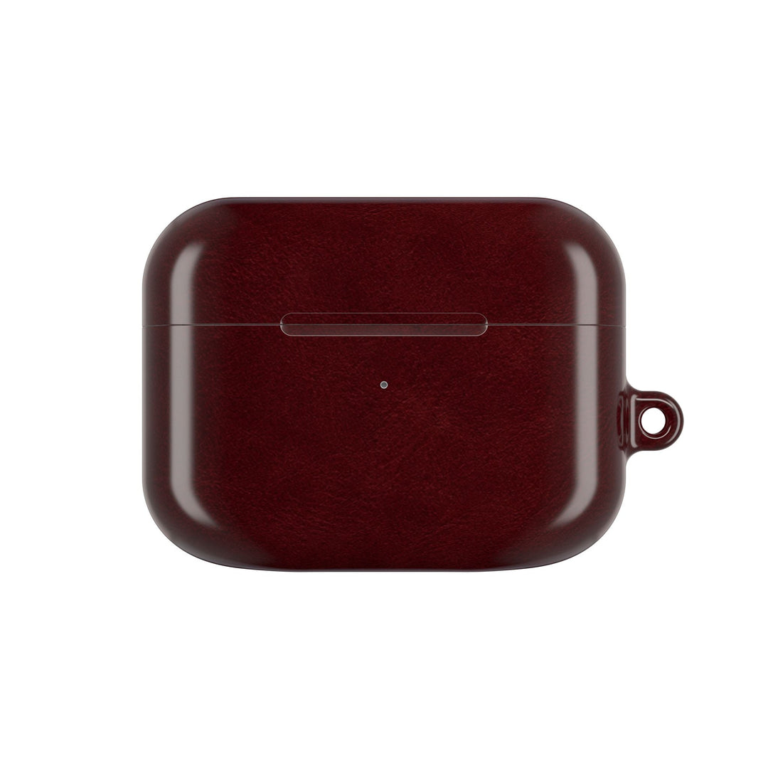 Sunday Theory burgundy glossy polycarbonate AirPod case with a side attachment loop for a carabiner