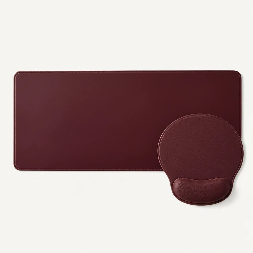 Sunday Theory burgundy desk mat and ergonomic mouse pad with memory foam wrist rest for a professional workspace