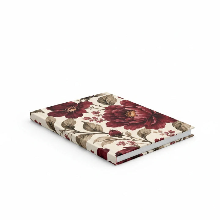 Sunday Theory vintage burgundy floral hardcover journal with a matte finish and cream background on a white surface.