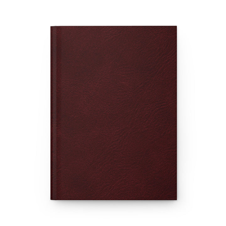 Sunday Theory burgundy hardcover journal with a matte finish and subtle marbled texture for daily writing.