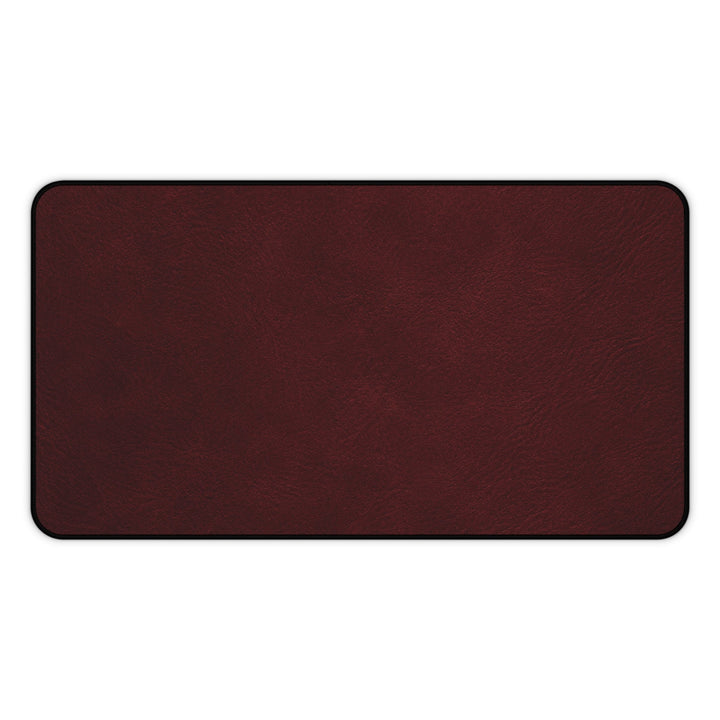 Sunday Theory burgundy neoprene desk mat with a smooth leather-look surface and durable hemmed edges.