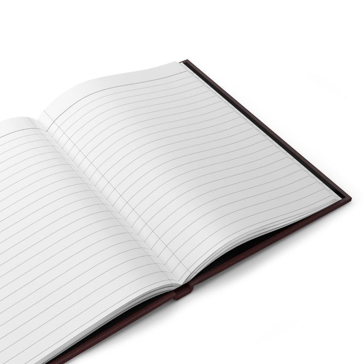 Sunday Theory burgundy hardcover journal open to show white lined pages with sewn casewrap binding