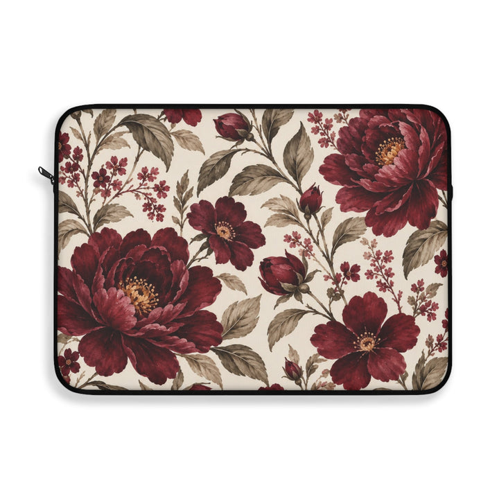 Sunday Theory laptop sleeve featuring a vintage burgundy peony floral print on a cream background with black trim.