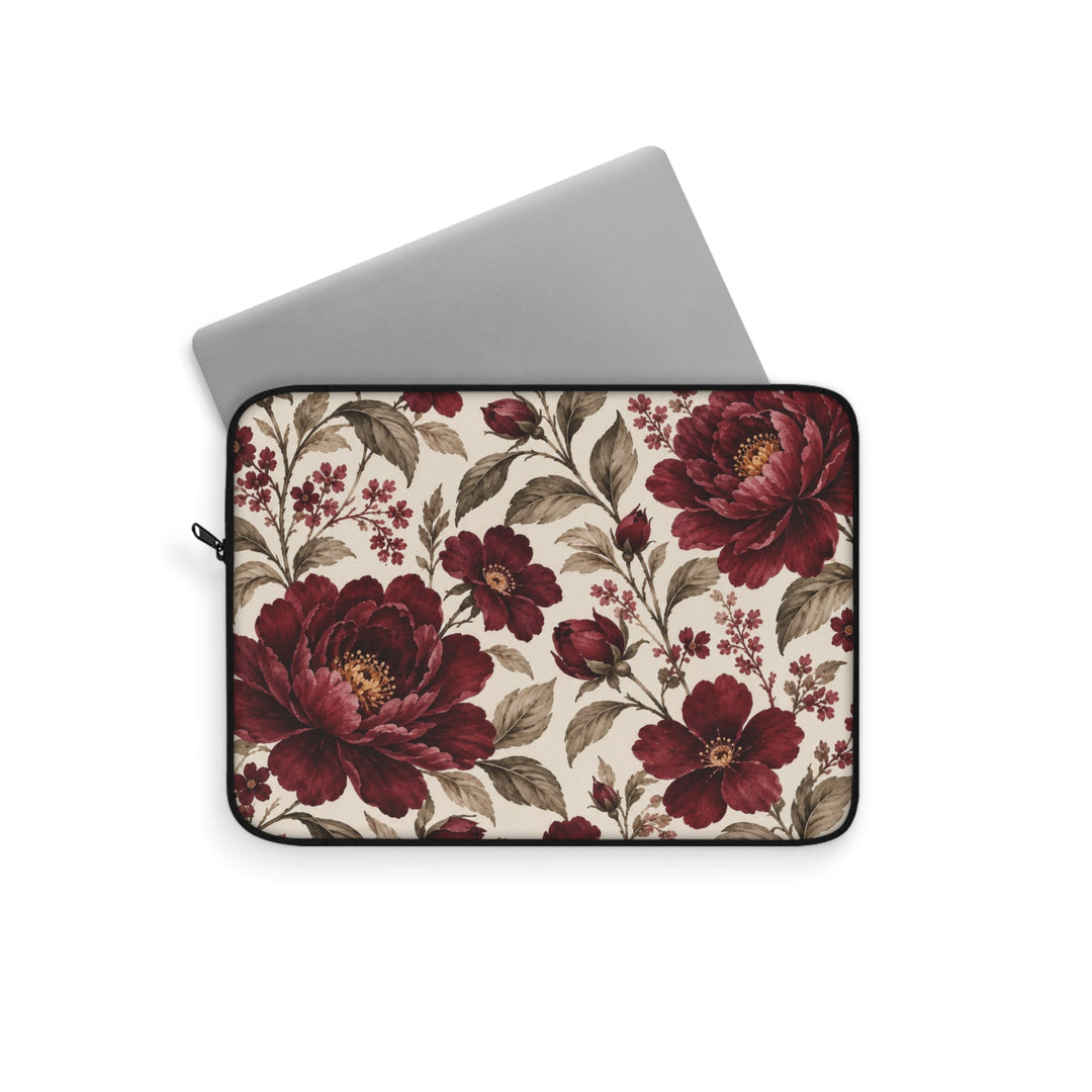 Sunday Theory laptop sleeve featuring vintage burgundy peony floral print on a cream background with a grey laptop