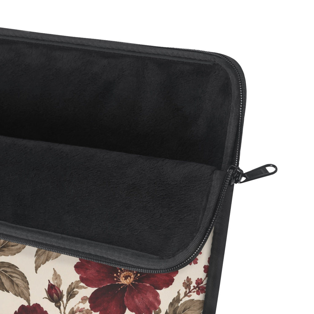 Sunday Theory laptop sleeve with a vintage burgundy peony floral print, black plush fleece interior, and zipper.