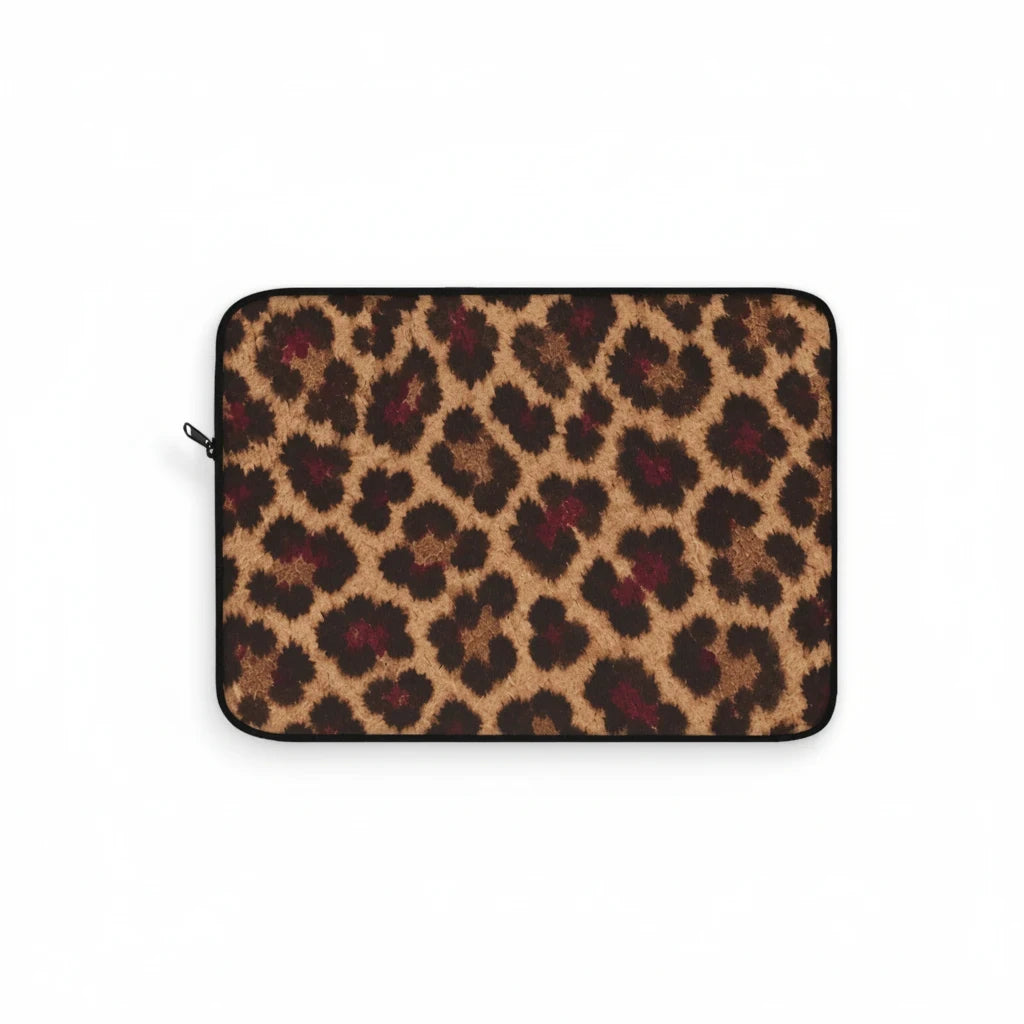 Sunday Theory leopard print laptop sleeve with tan, brown, and berry spots and a protective fleece interior.