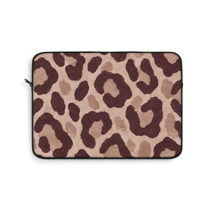 Sunday Theory leopard print laptop sleeve in blush and burgundy with a protective polyester exterior and zipper.