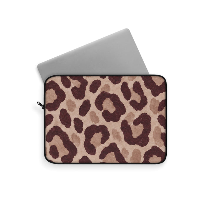 Sunday Theory leopard print laptop sleeve in blush and burgundy with a protective fleece interior and zipper closure.