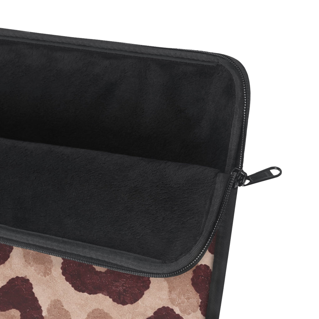 Sunday Theory leopard print laptop sleeve with blush and burgundy spots, black fleece interior, and metal zipper.