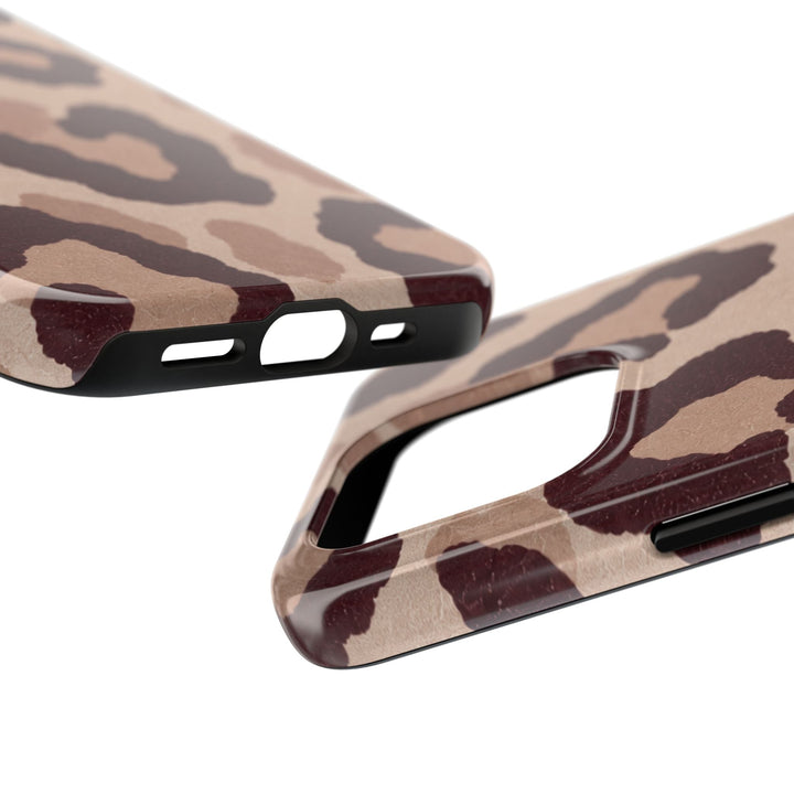 Sunday Theory leopard print phone case with glossy brown animal pattern and durable black shock-absorbent TPU liner