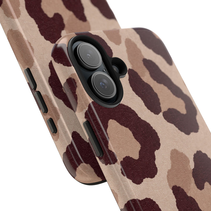 Sunday Theory leopard print phone case with glossy finish, brown animal pattern, and shock-absorbing TPU edges.