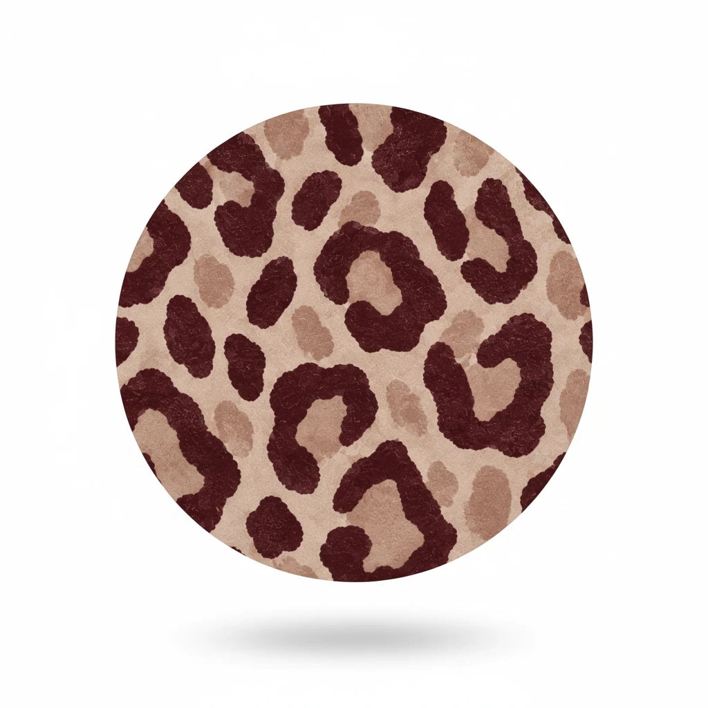 Sunday Theory round mouse pad featuring a chic brown leopard animal print on soft, cushioned neoprene material.