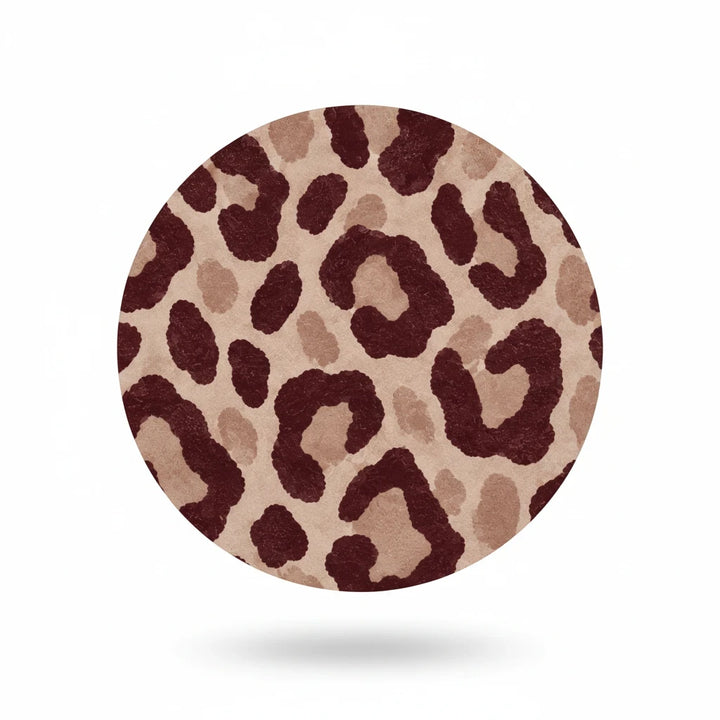 Sunday Theory round mouse pad featuring a chic brown leopard animal print on soft, cushioned neoprene material.