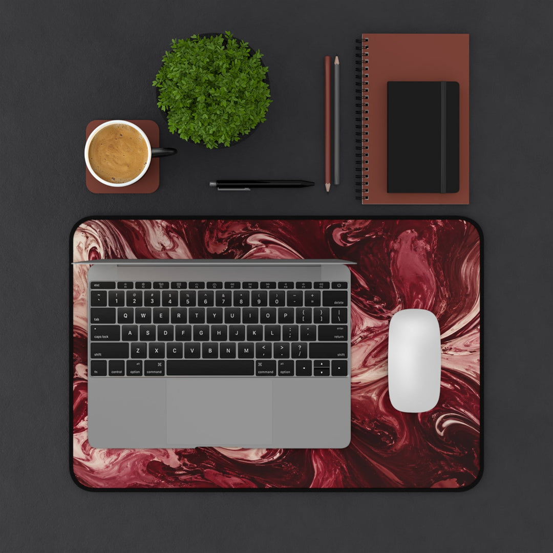 Sunday Theory maroon marble desk mat with burgundy swirl pattern, featuring a laptop, mouse, and office accessories.