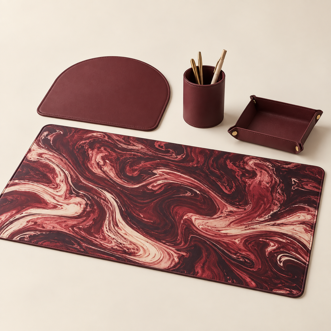Sunday Theory maroon marble desk mat and ergonomic mouse pad set with matching burgundy desk accessories
