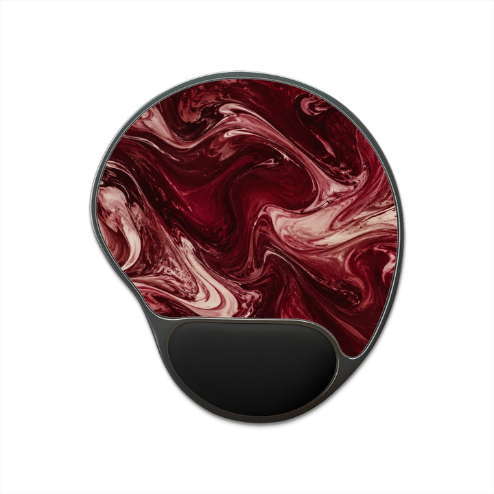 Sunday Theory maroon marble mouse pad with ergonomic black memory foam wrist rest on a stable foot-shaped base.