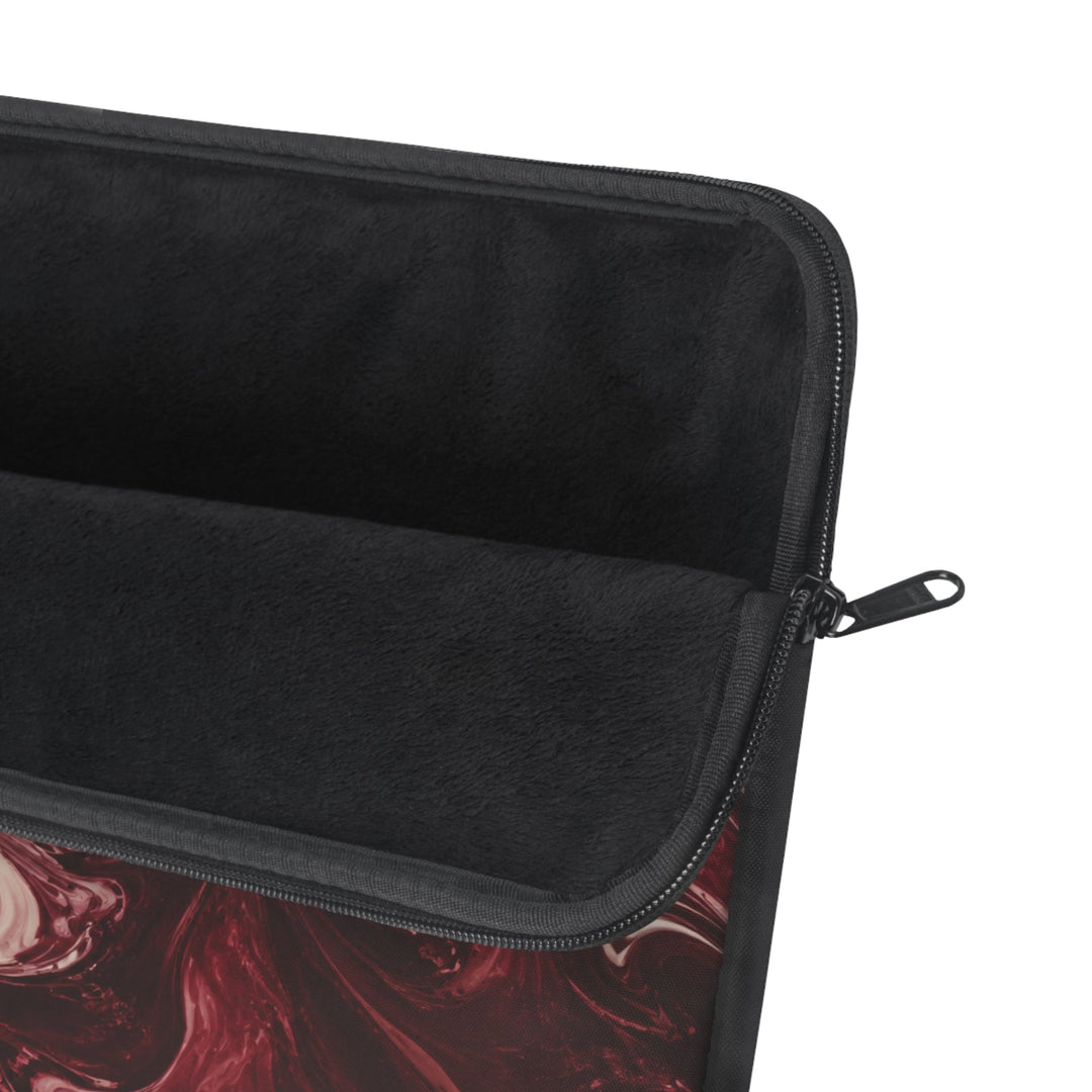 Sunday Theory maroon and cream marble swirl laptop sleeve with a plush black fleece interior and durable zipper