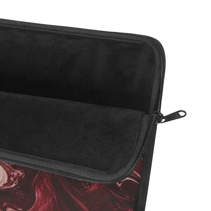 Sunday Theory maroon and cream marble swirl laptop sleeve with a plush black fleece interior and durable zipper