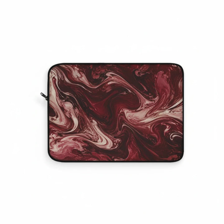 Sunday Theory maroon and cream marble swirl laptop sleeve with a protective black trim and smooth side zipper.