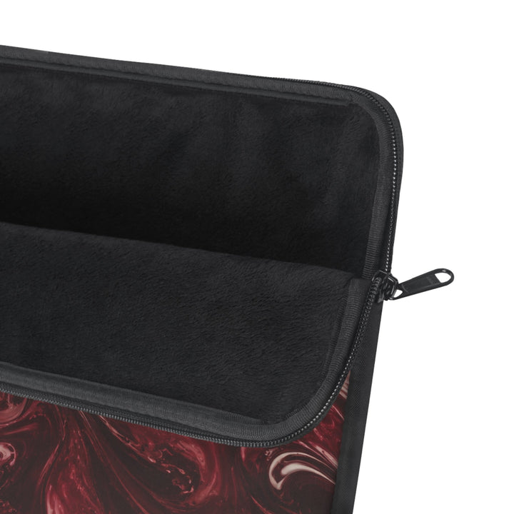 Sunday Theory maroon and cream marble swirl laptop sleeve with a soft black fleece interior and durable zipper.