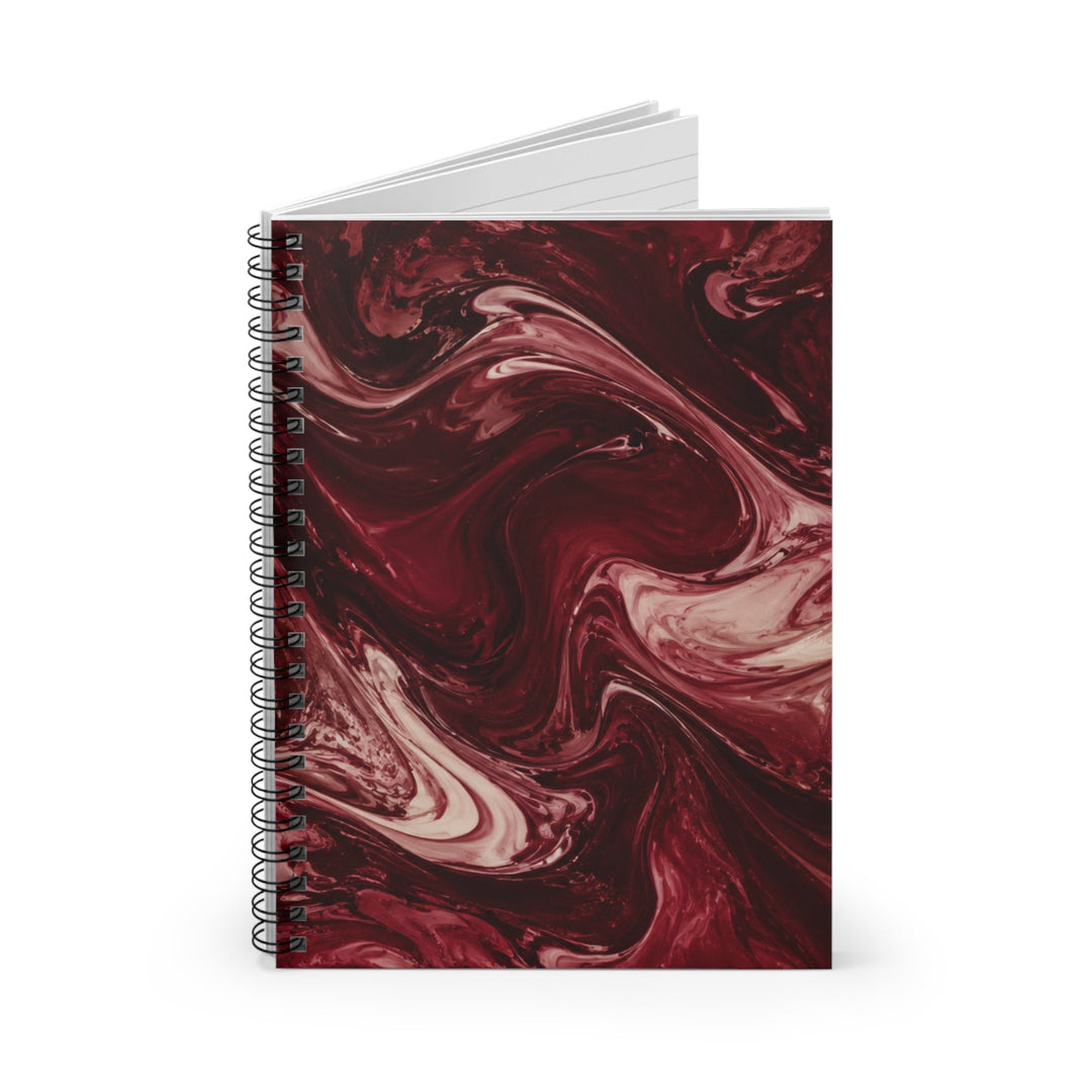 Sunday Theory maroon marble spiral notebook with cream swirls and black metal binding for journaling and notes.