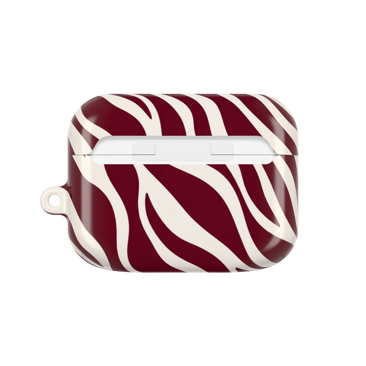 Sunday Theory maroon and cream zebra stripe polycarbonate AirPod case with a glossy finish and slim profile.