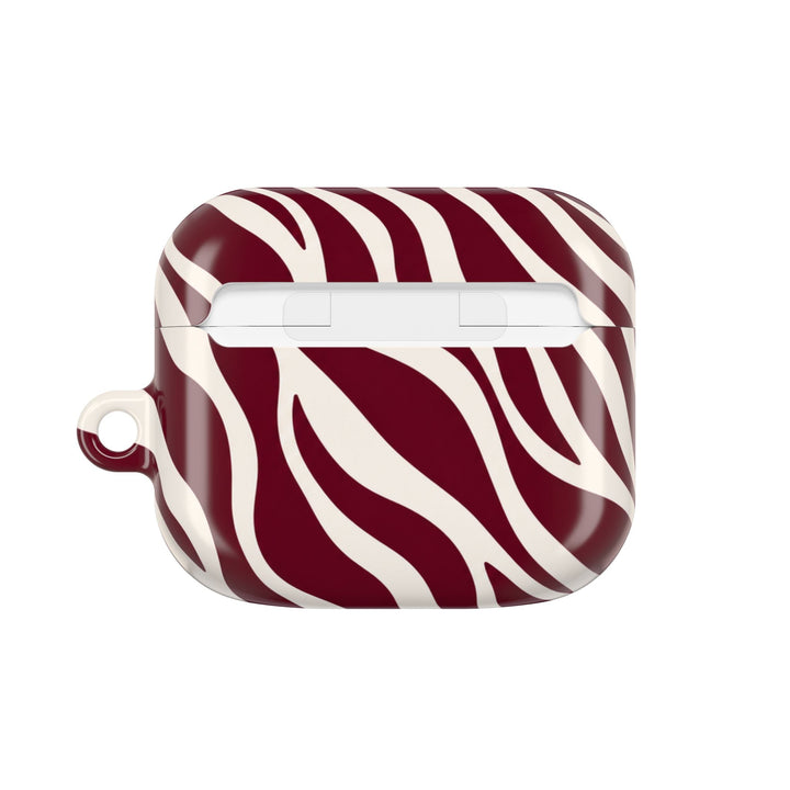 Sunday Theory maroon and cream zebra stripe polycarbonate AirPod case with a glossy finish and slim profile.