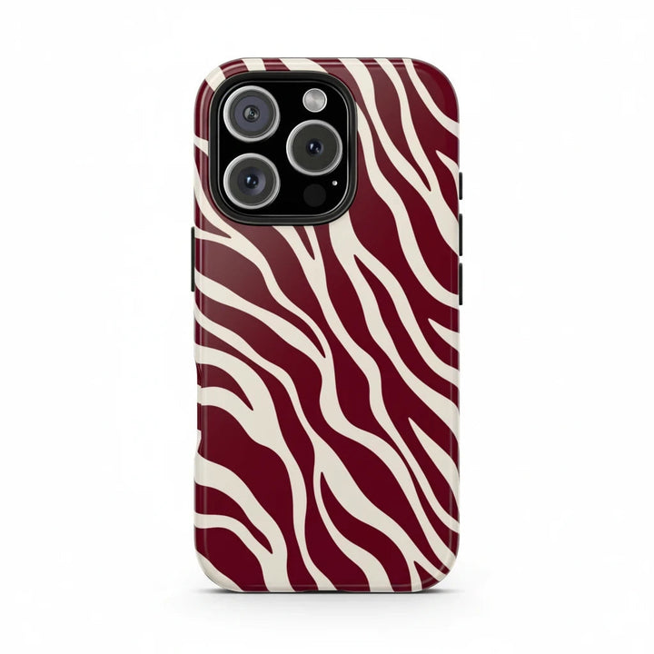 Sunday Theory maroon and cream zebra print protective phone case with a glossy finish and raised camera bezel.