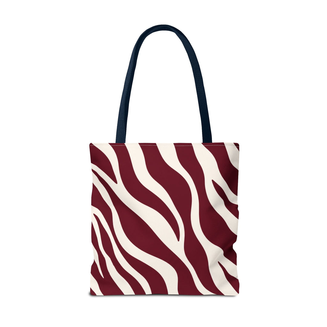 Sunday Theory maroon and cream zebra print tote bag with dark navy shoulder straps against a white background