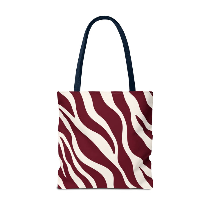 Sunday Theory maroon and cream zebra print tote bag with dark navy shoulder straps against a white background