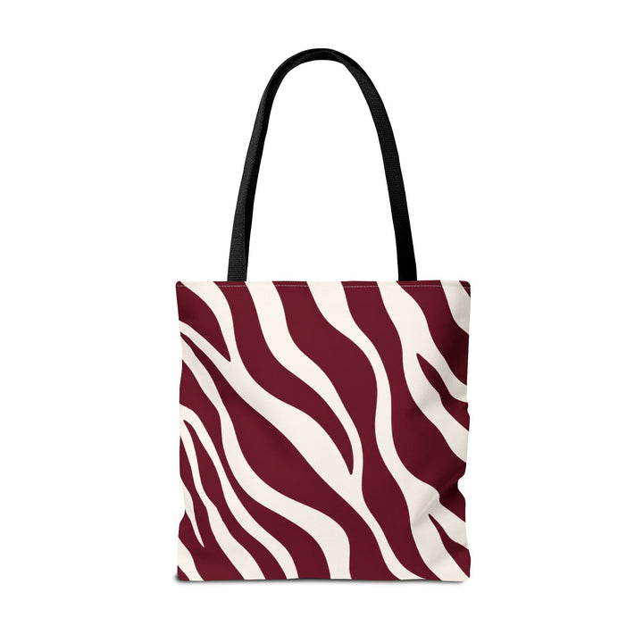 Sunday Theory maroon and cream zebra print polyester tote bag with black handles and structured boxed corners.