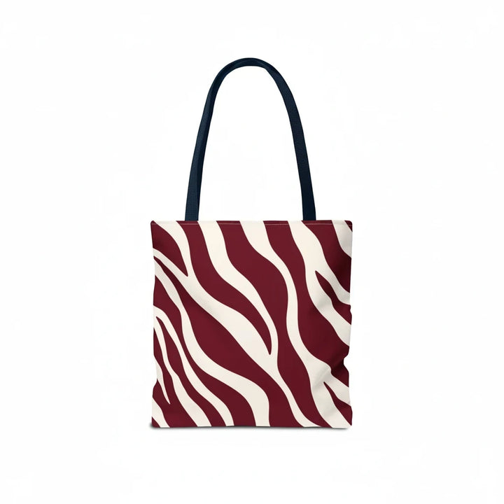 Sunday Theory maroon and cream zebra print tote bag with dark handles against a white background