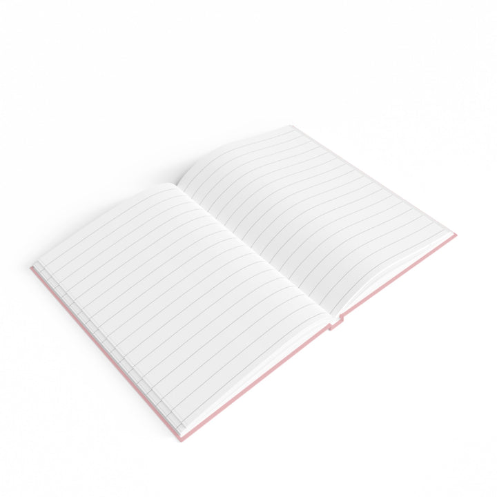 Sunday Theory pink hardcover journal opened to show clean white ruled pages with lay-flat binding on white background