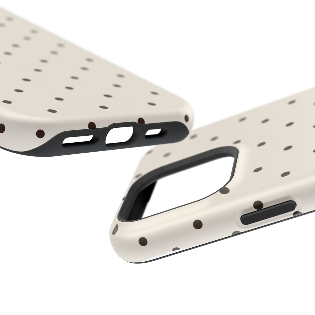Sunday Theory cream smartphone case with dark brown polka dots, featuring magnetic impact-resistant design.