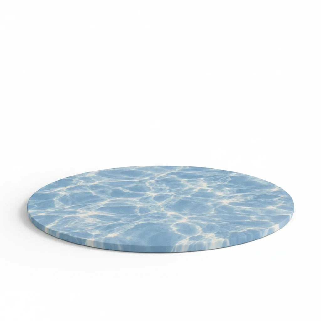 Sunday Theory round mouse pad with a blue water ripple pattern and a non-slip neoprene rubber base